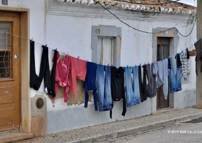 Traditional Portuguese house with laundry in Santa Catarina da Fonte do Bispo